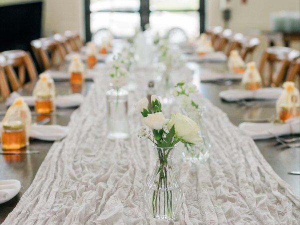 Elegant wedding reception tablescape with floral centerpieces designed by Selah Floral Studio in Central Pennsylvania.
