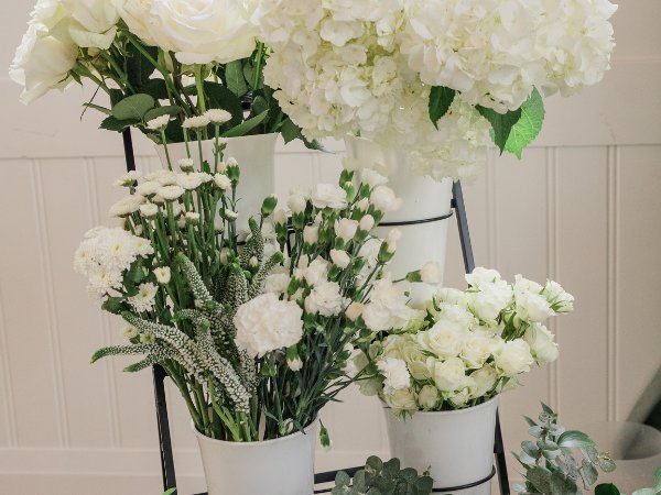 Fresh white wedding flowers prepared for a custom bloom bar by Selah Floral Studio in Howard, PA.