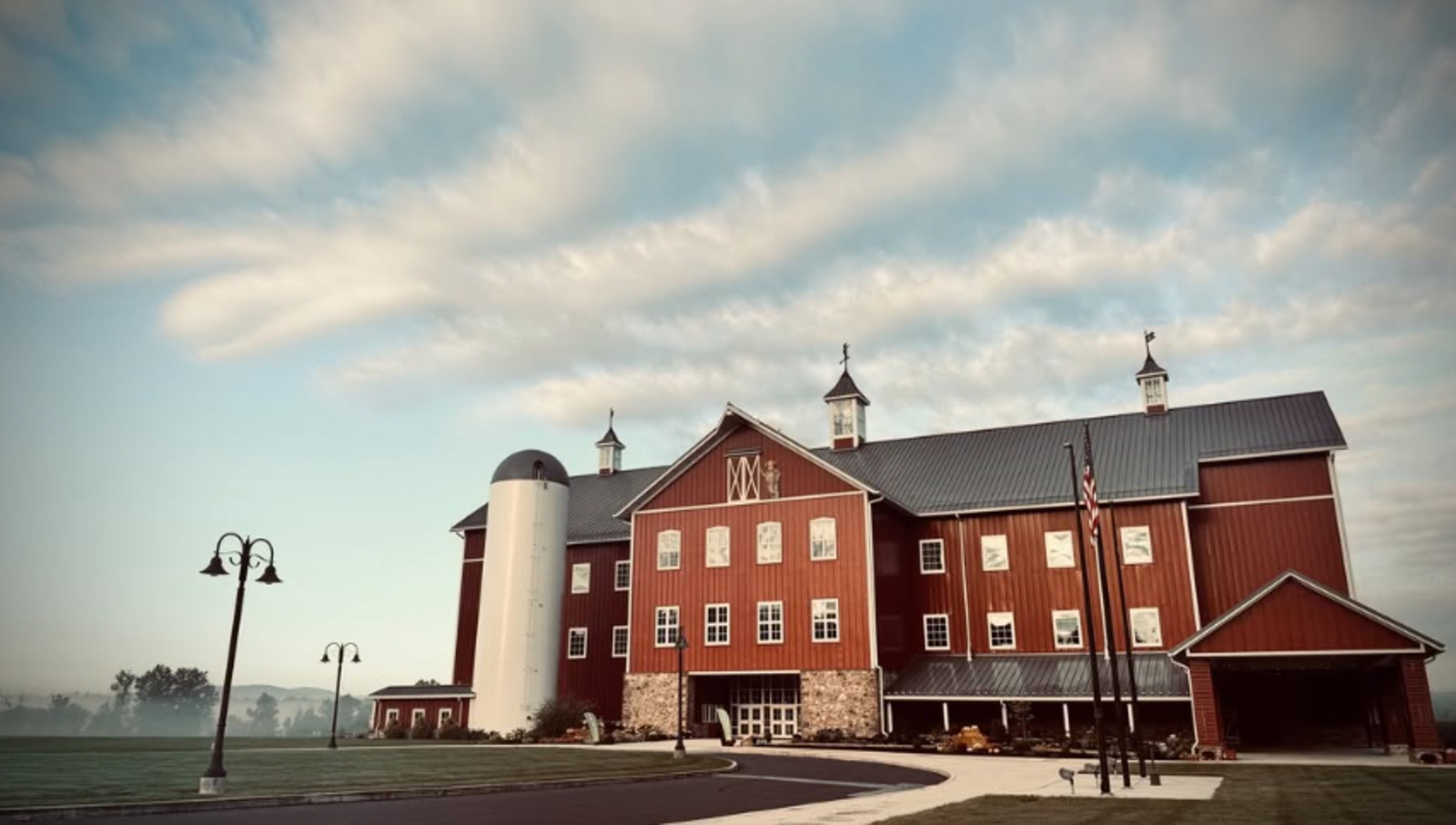 The Barn Resort wedding venue in Gettysburg, PA, featuring a large red barn and silo.