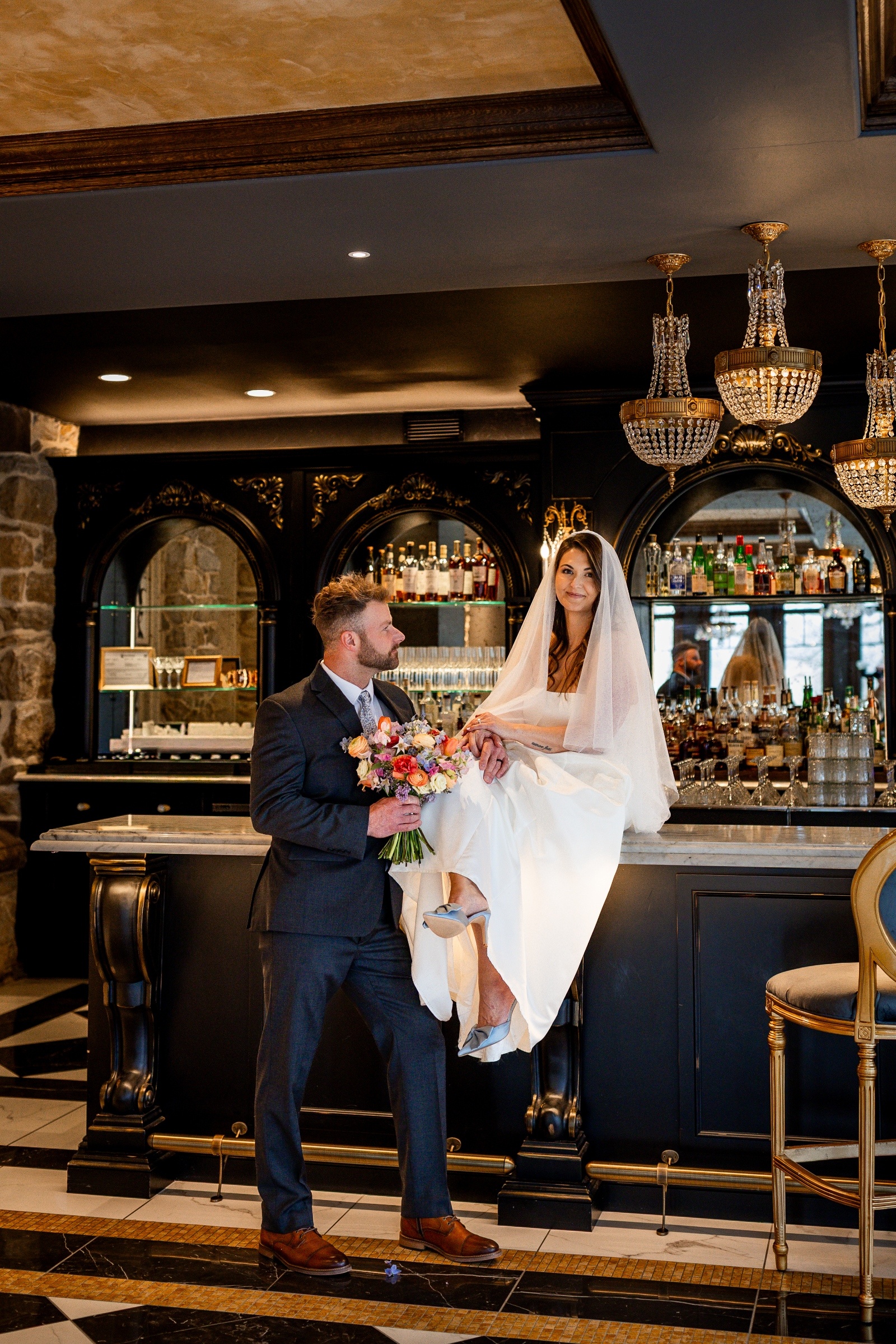 Bride and groom pose for portraits inside The Willows at Ashcombe mansion during their Central Pennsylvania elopement.