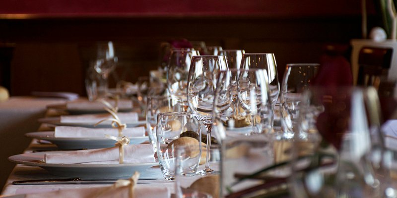 Empty Wine Glasses On Rehearsal Dinner Table